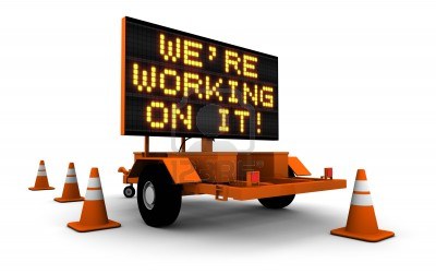 11578852-haute-resolution-3d-render-de-message-board-construction-des-signes-et-des-cones--nous